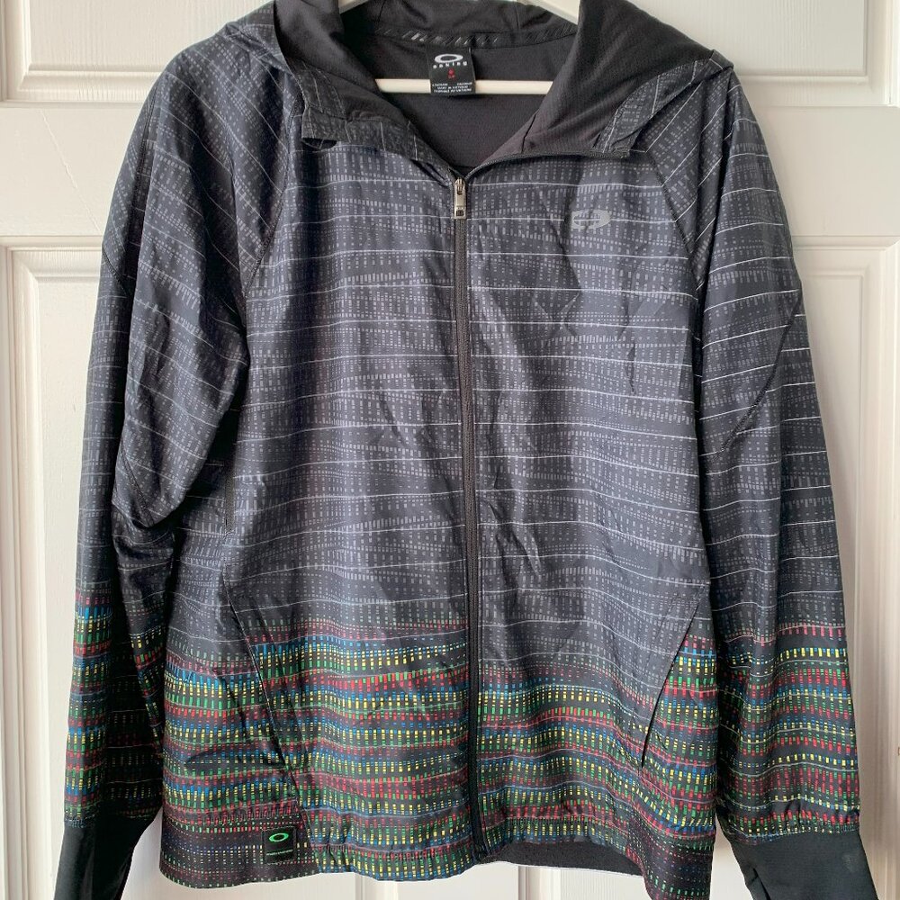 Oakley women's soft shell windbreaker jacket size Small with reflective stripes